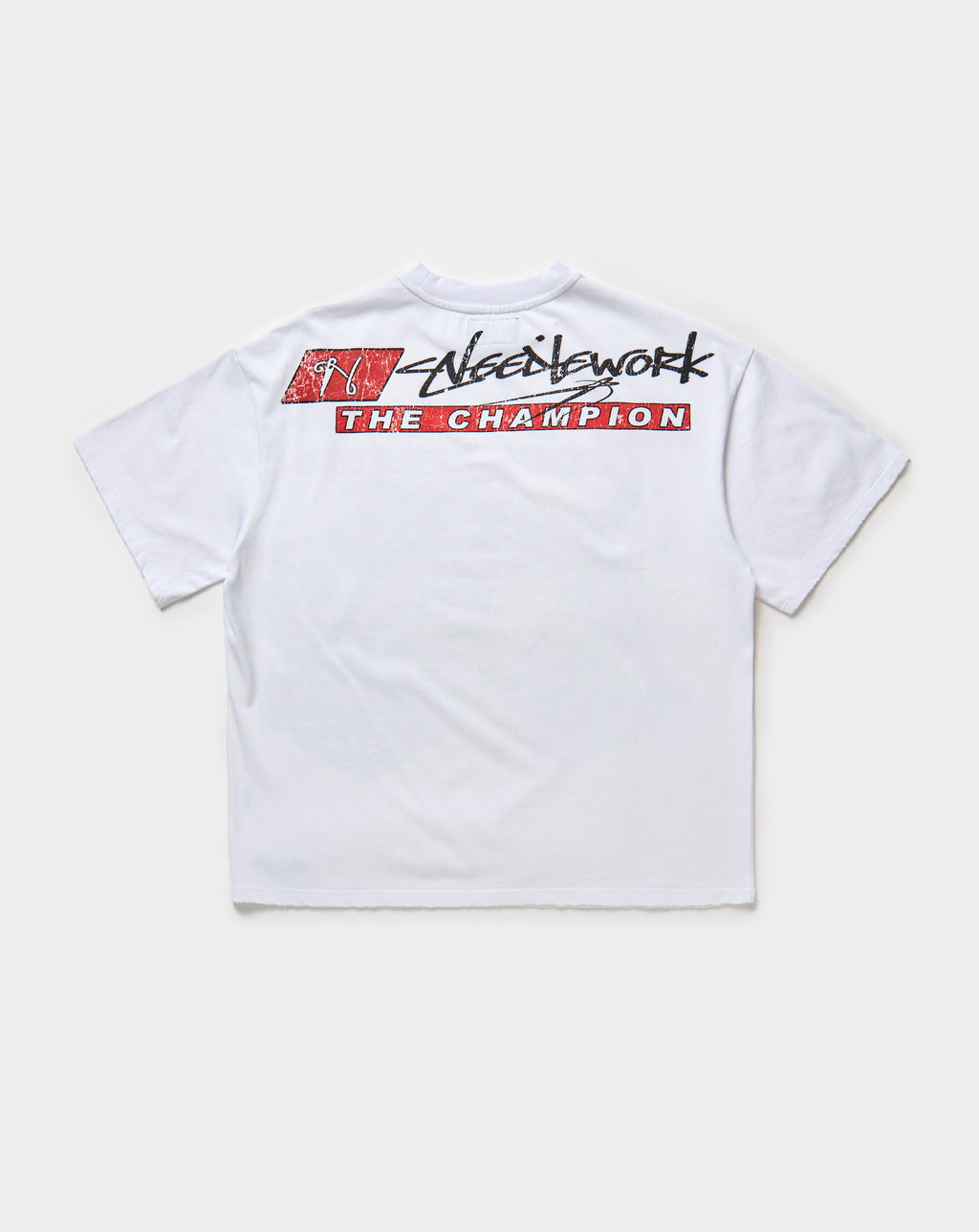 Needlework The Champion T-Shirt. Underground Apparel. Rule of Next Streetwear.