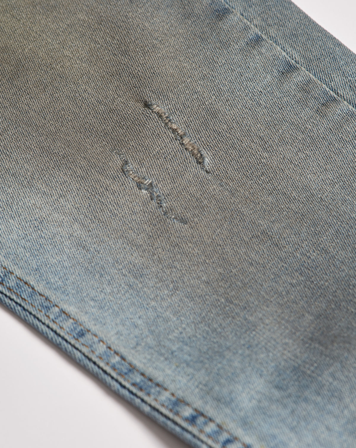 Rip Knee Skinny Jeans