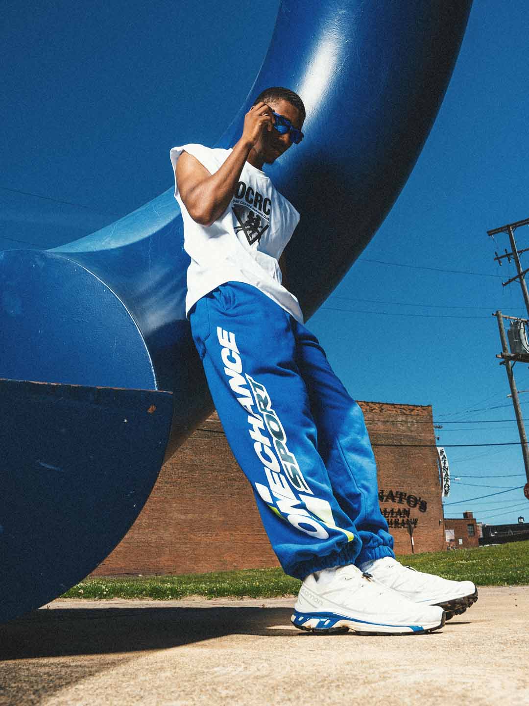 One Chance campaign styled with blue track pants