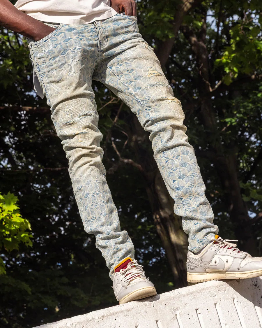 Purple Brand patterned denim styled with white sneakers
